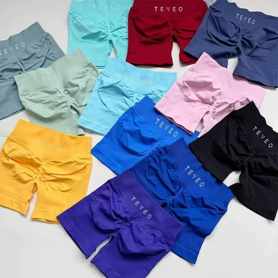 TEVEO Short De Yoga Femme Extensible Respirant Pêche Hanche Hanche Fitness Short de Course Hanche Haute Stretch Mèches De Sueur Main image