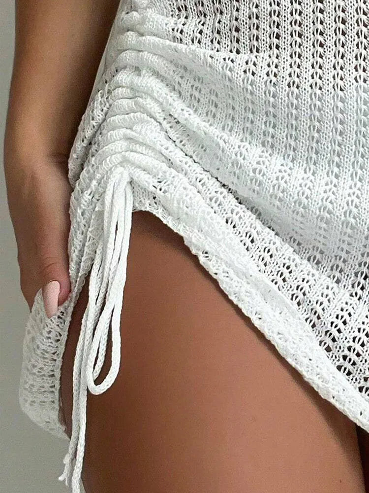 Fashionable and elegant short skirt pool party with hollowed out drawstring bikini knit short skirt summer beach